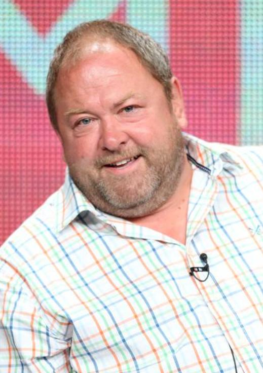 A portrait of Mark Addy